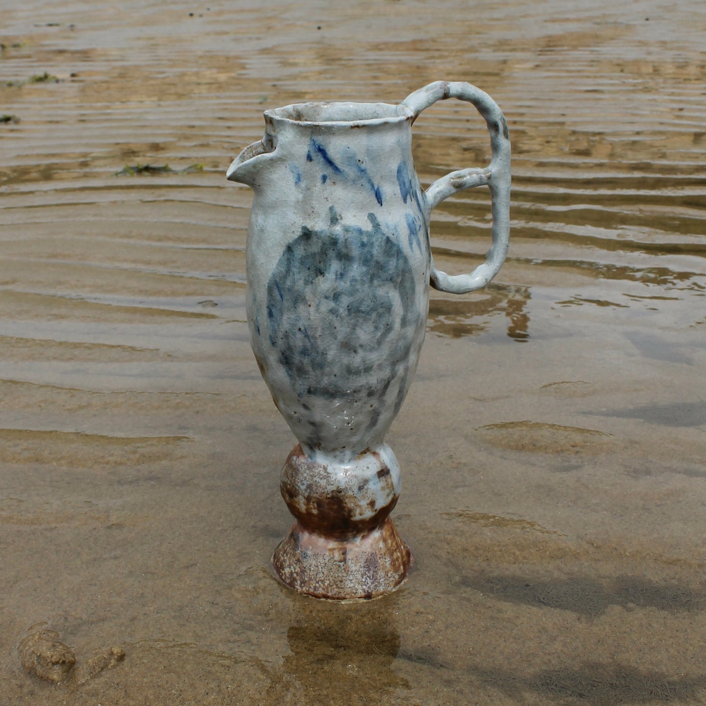 pedestal loop pitcher