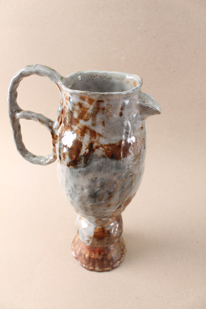 pedestal loop pitcher