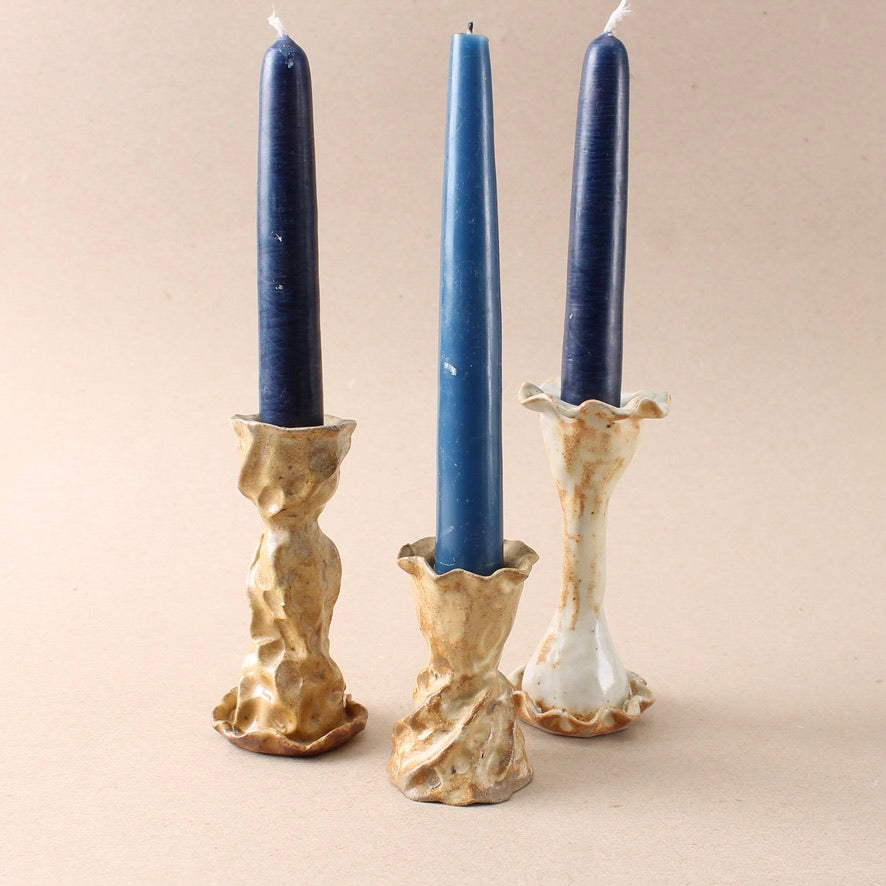 brown candlestick trio