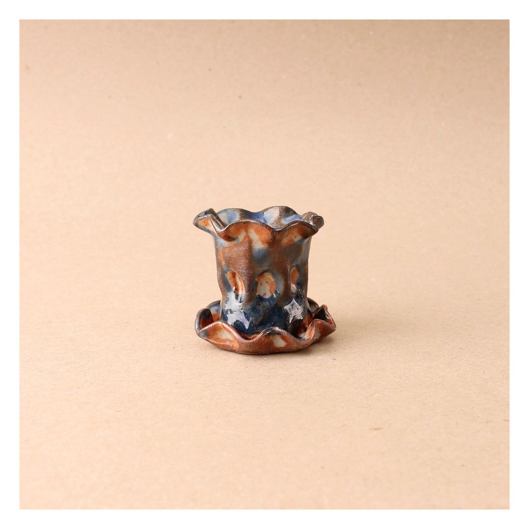 short blue orange frill candlestick