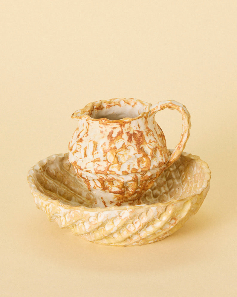 small brown pitcher
