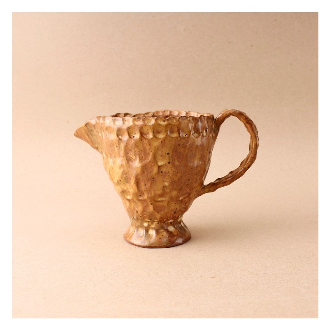brown pinch pitcher