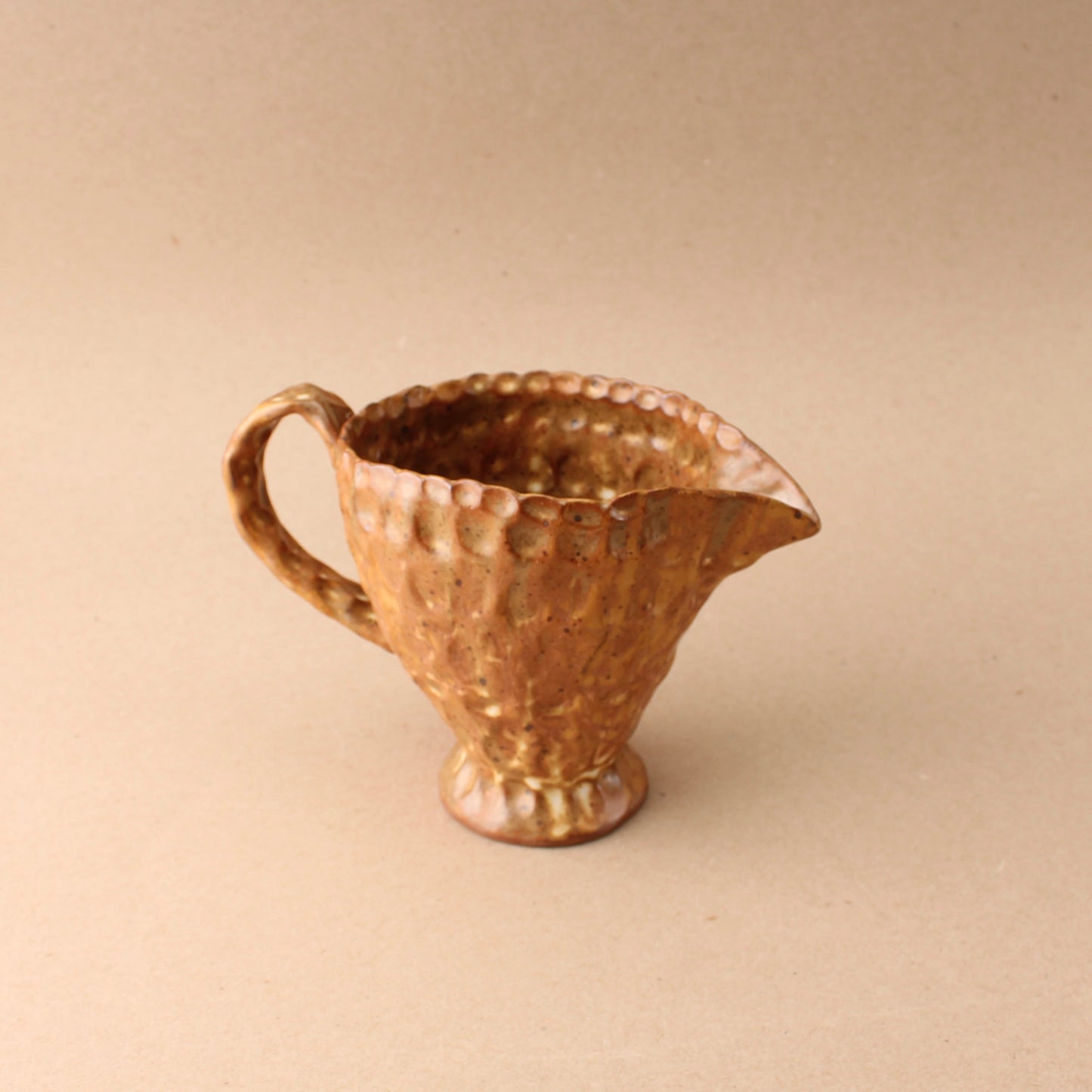 brown pinch pitcher