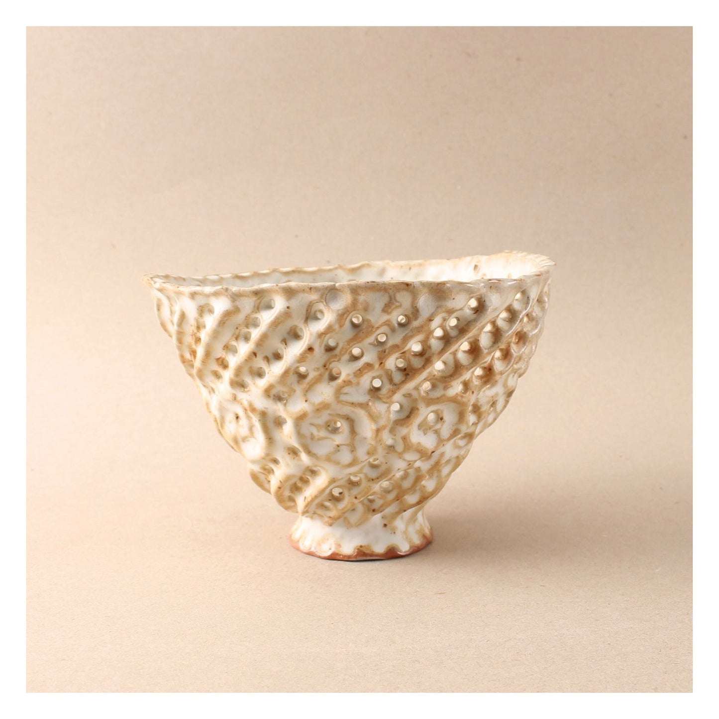 brown strainer bowl