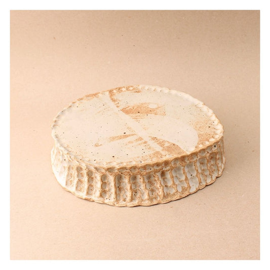 large beige pedestal