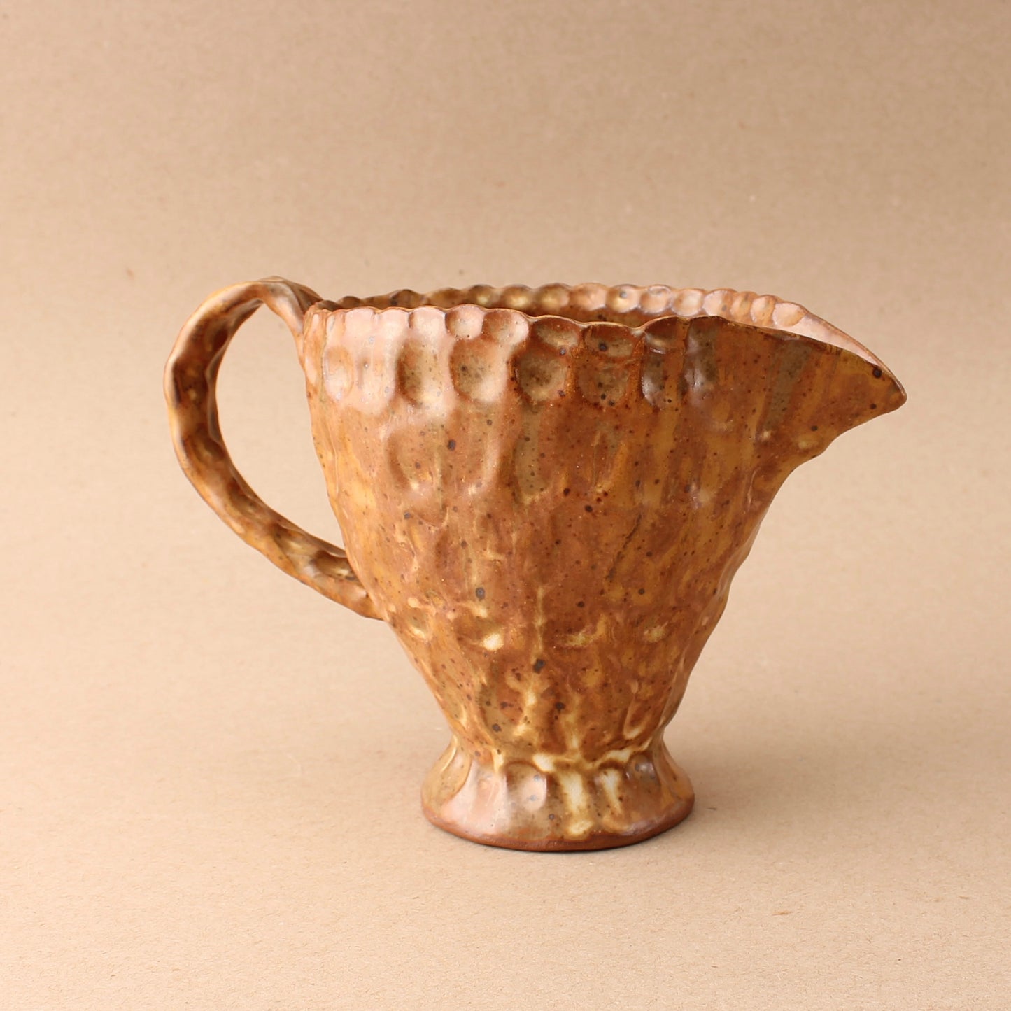 brown pinch pitcher