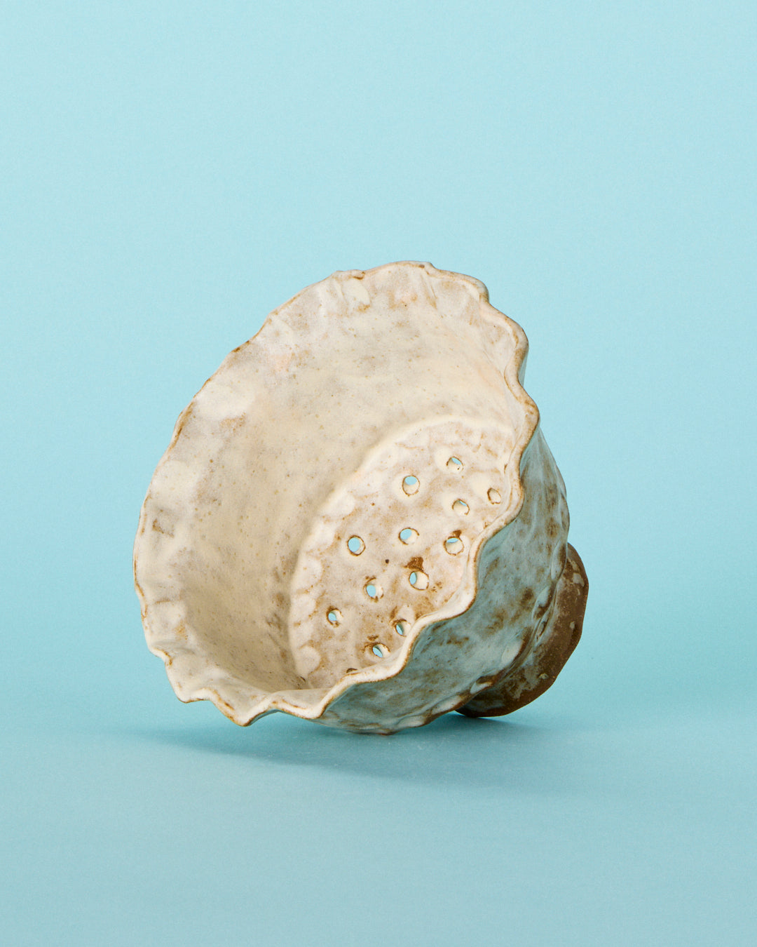 white strainer berry bowl