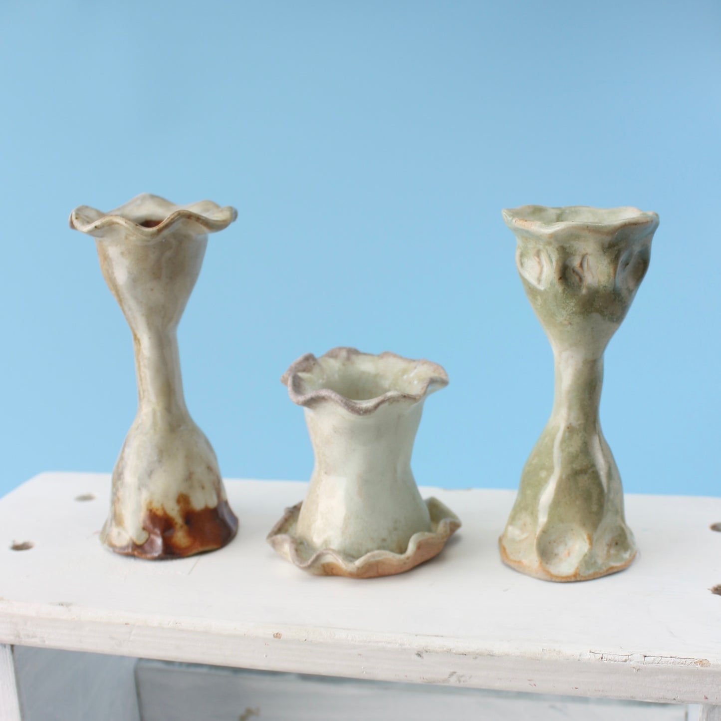 light green candlestick trio