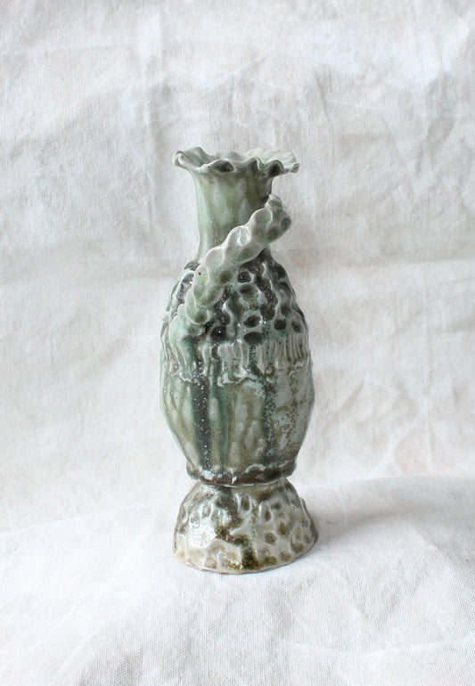 green flat pinch handled vase