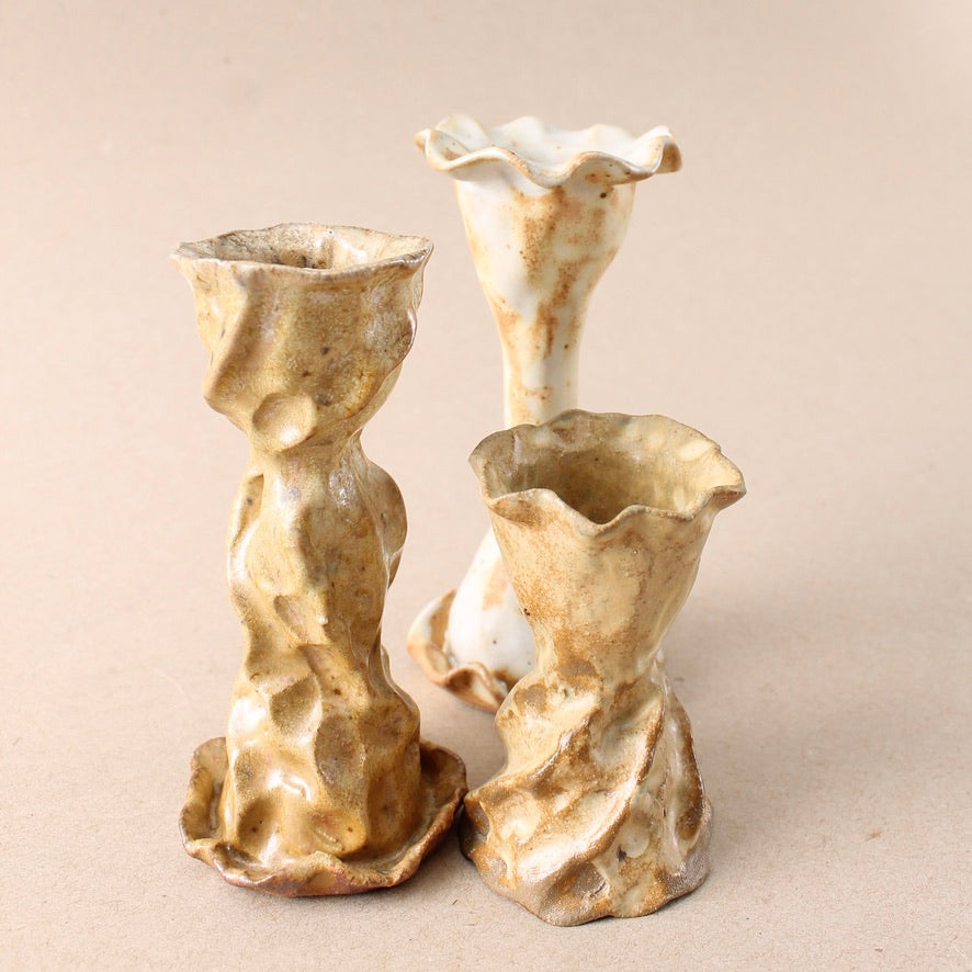 brown candlestick trio