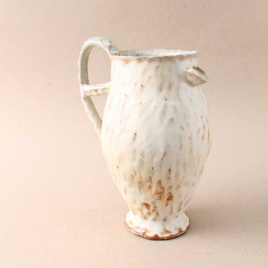 tan loop pitcher