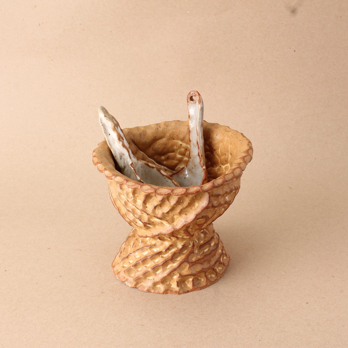 brown pinched ridge pedestal bowl