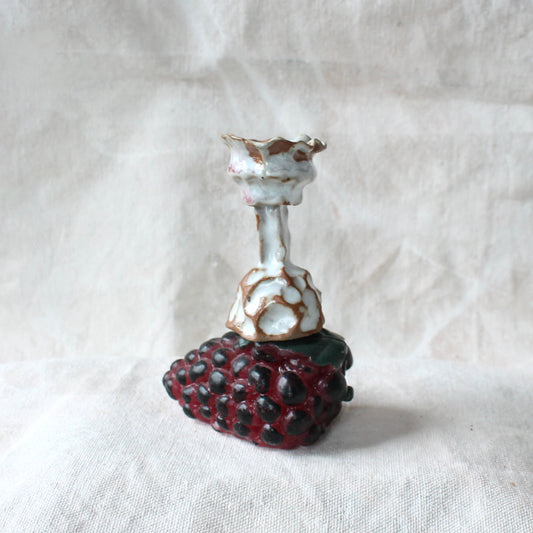 small statue candleholder