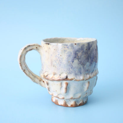 blue grid pinch mug