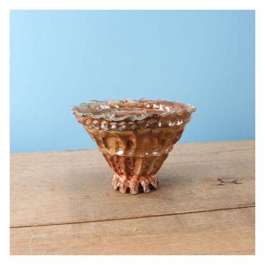 metallic brown strainer bowl