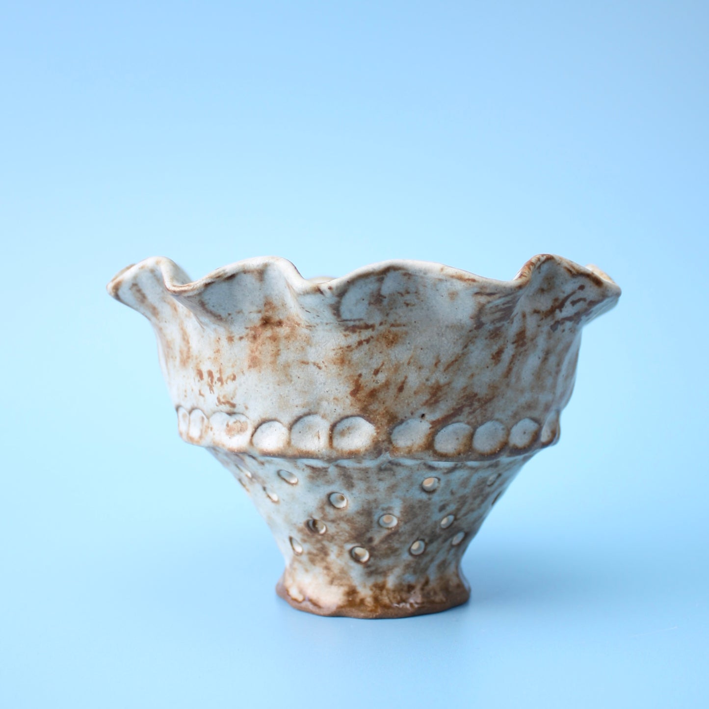 white strainer berry bowl