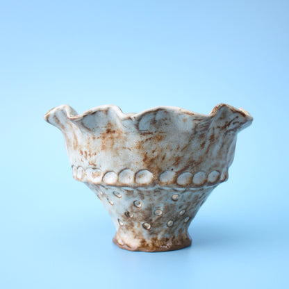 white strainer berry bowl