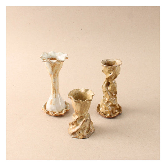 brown candlestick trio
