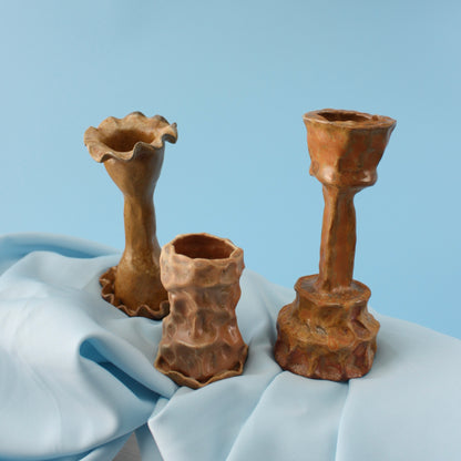 orange candlestick trio