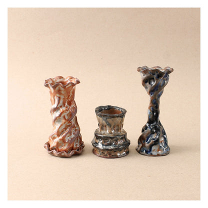 dark blue candlestick trio