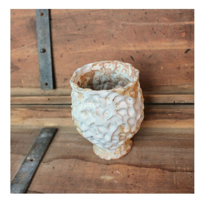 beige pinch bud vase