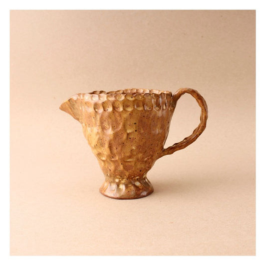brown pinch pitcher