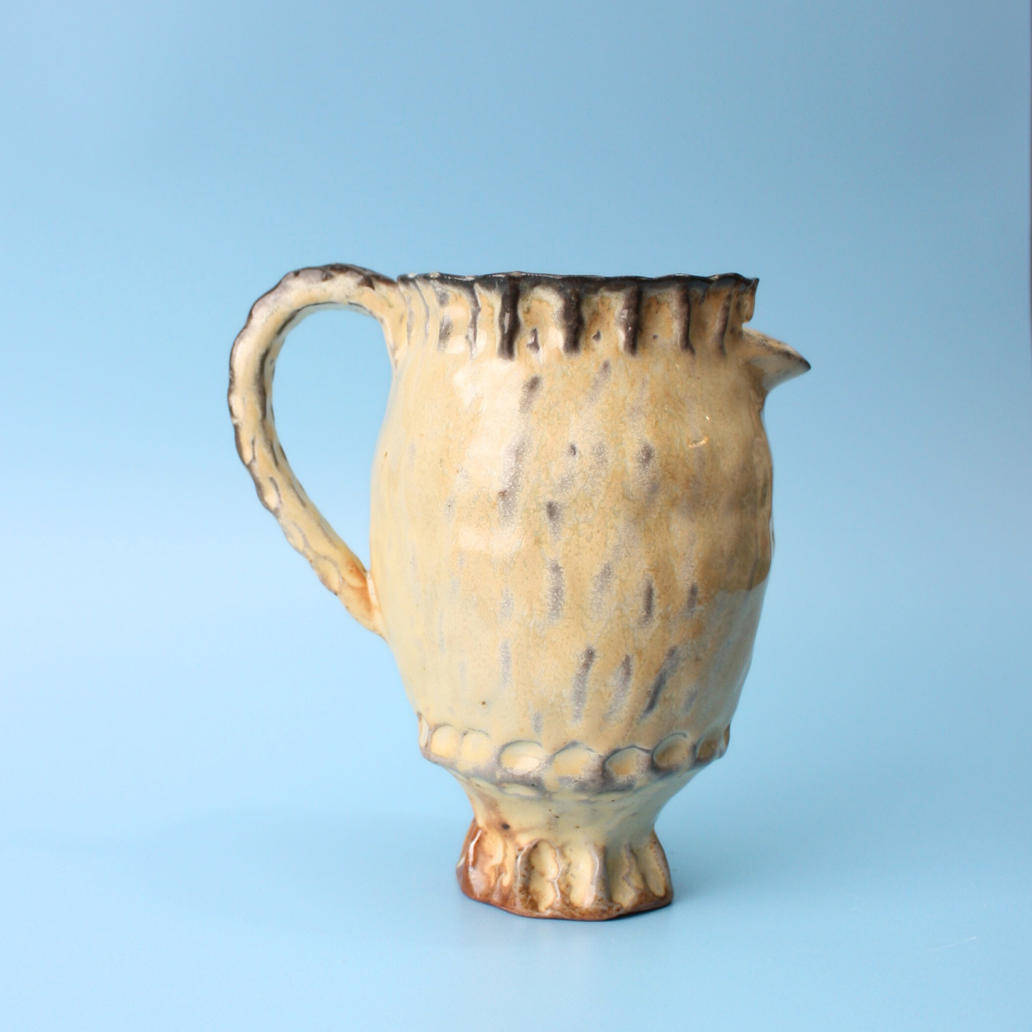 small yellow pitcher