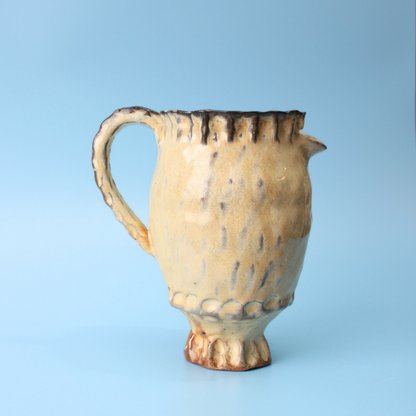 small yellow pitcher