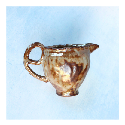 brown small pitcher