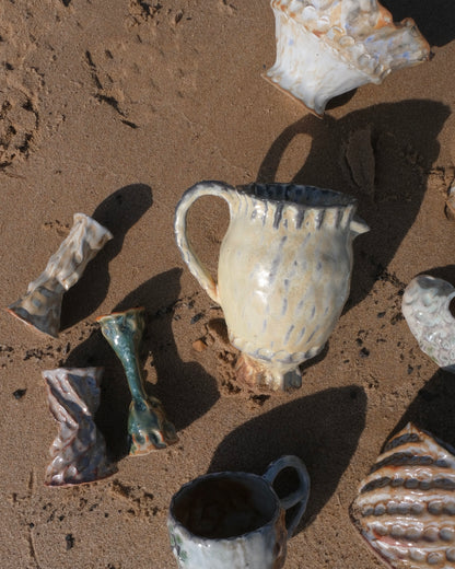 small yellow pitcher