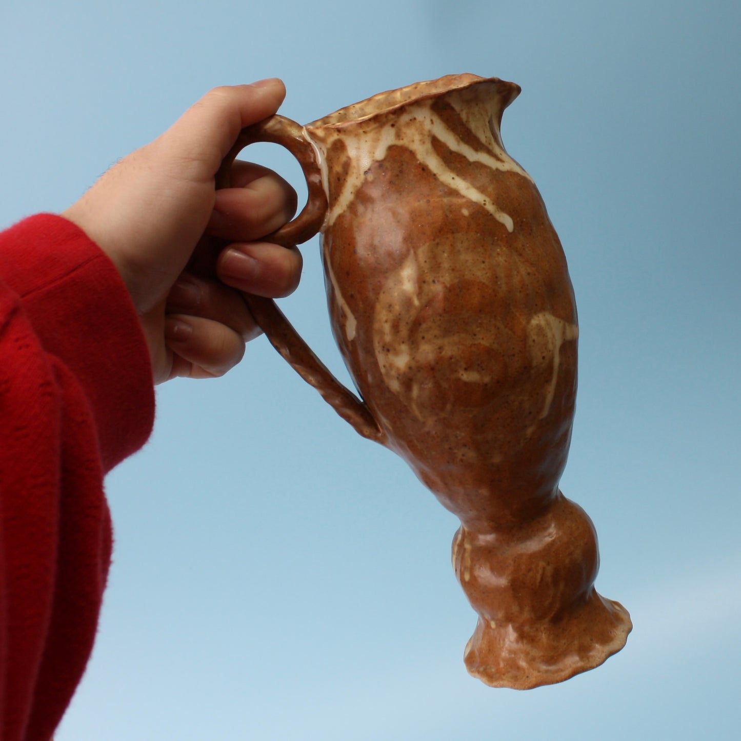 small brown pedestal pitcher
