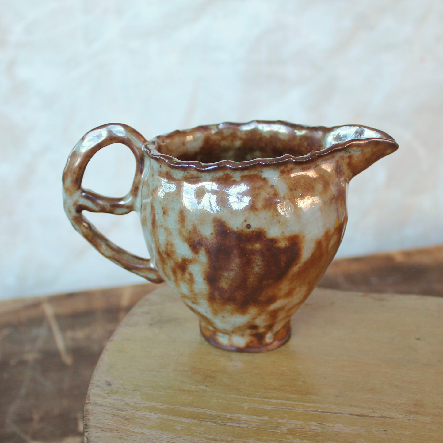 brown small pitcher