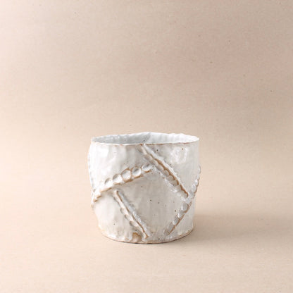 white cylinder vase
