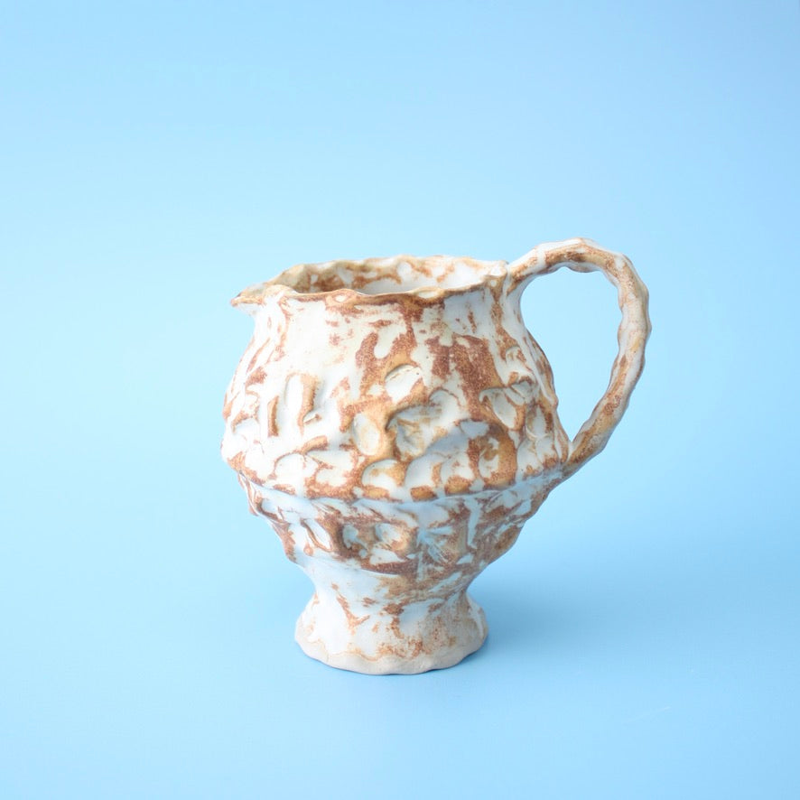 small brown pitcher