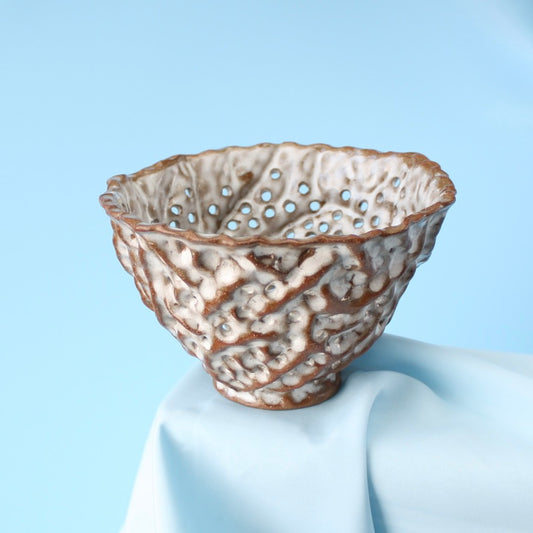 brown strainer berry bowl