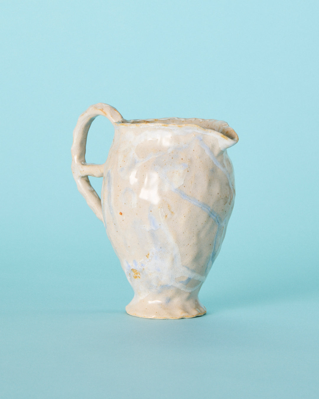 medium white pitcher