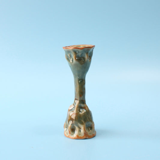 green pinch candlestick