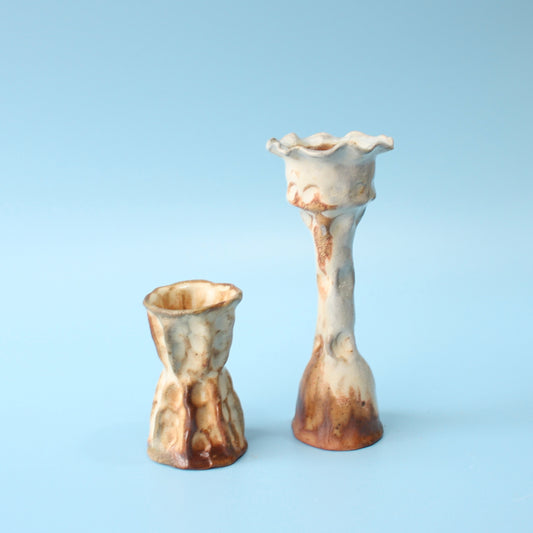 beige candlestick duo