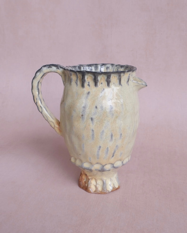 small yellow pitcher