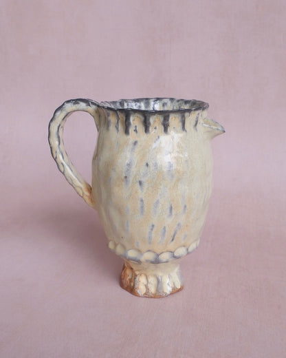 small yellow pitcher