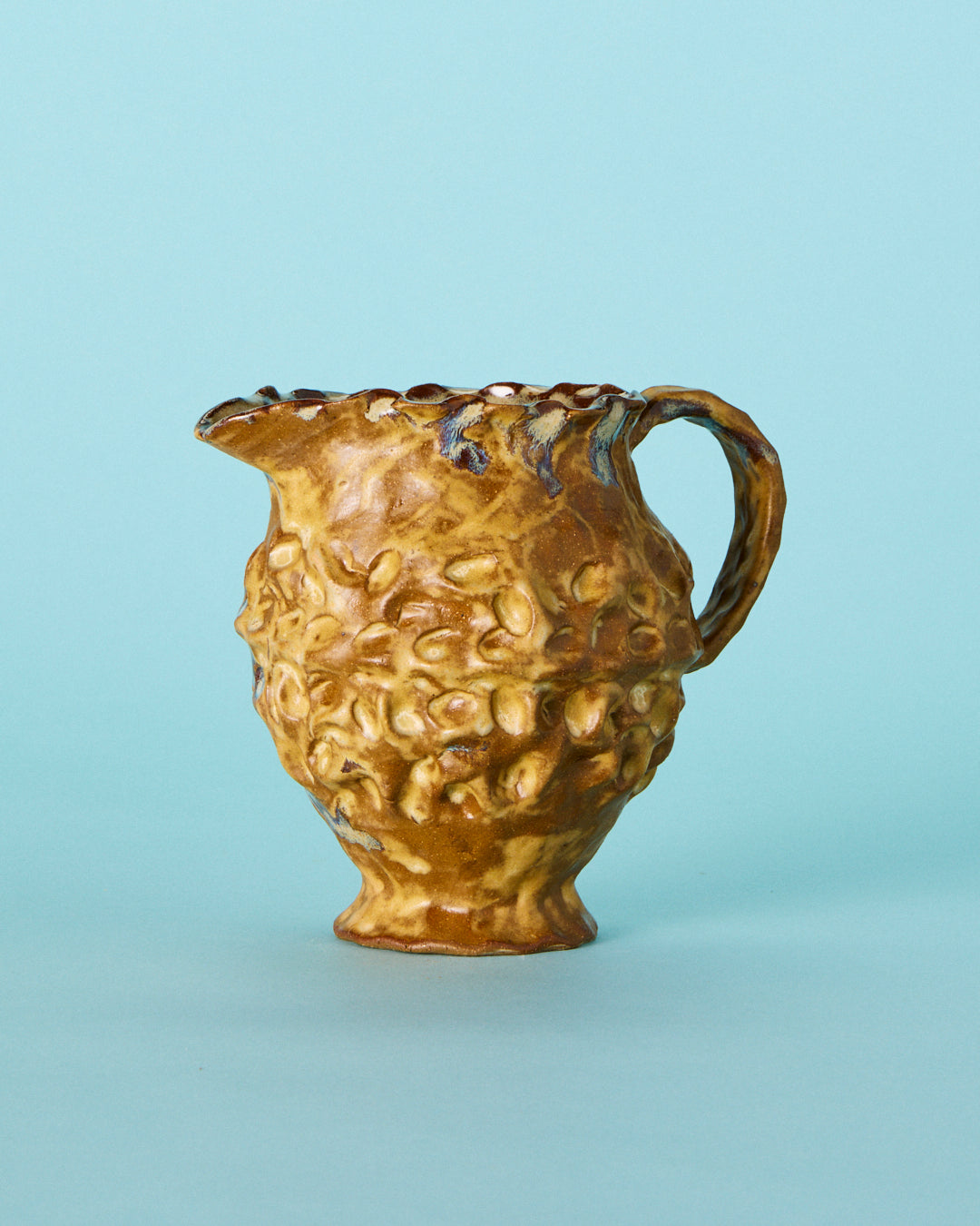 brown pinch pitcher