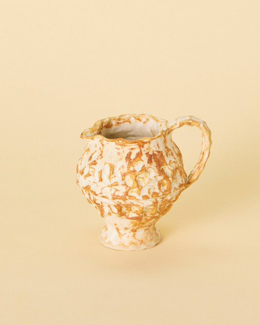 small brown pitcher