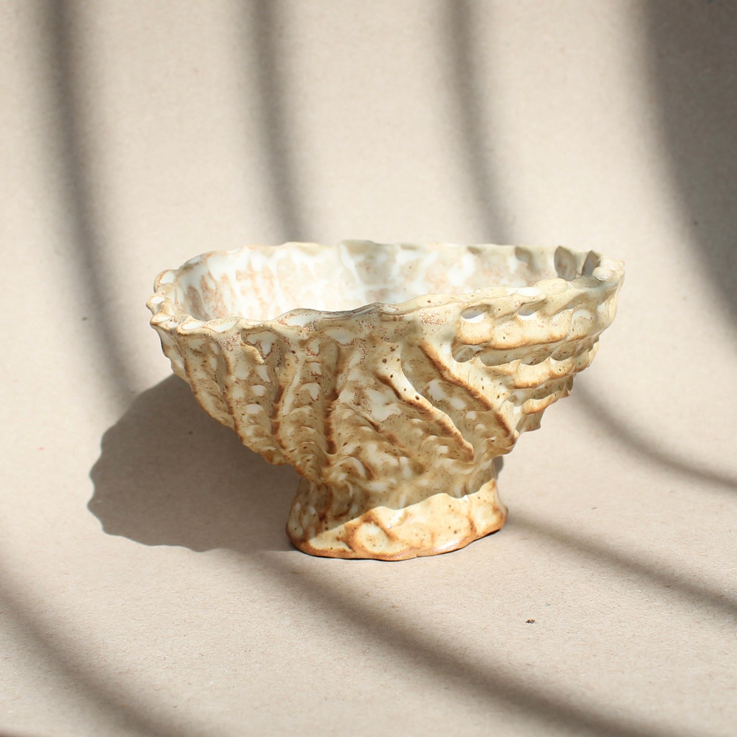 beige pinch bowl