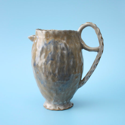 grey pitcher