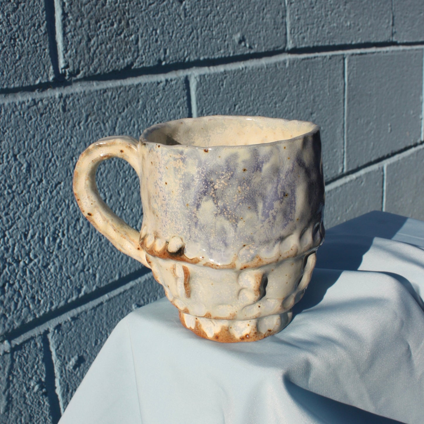 blue grid pinch mug