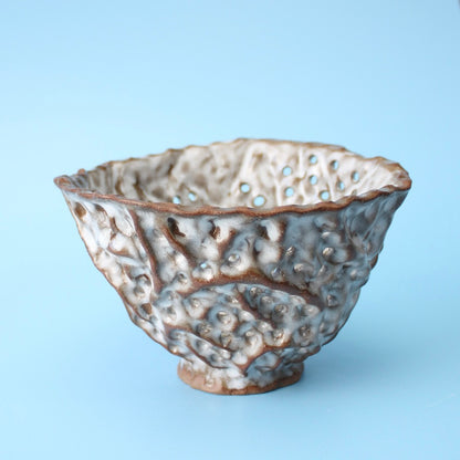 brown strainer berry bowl