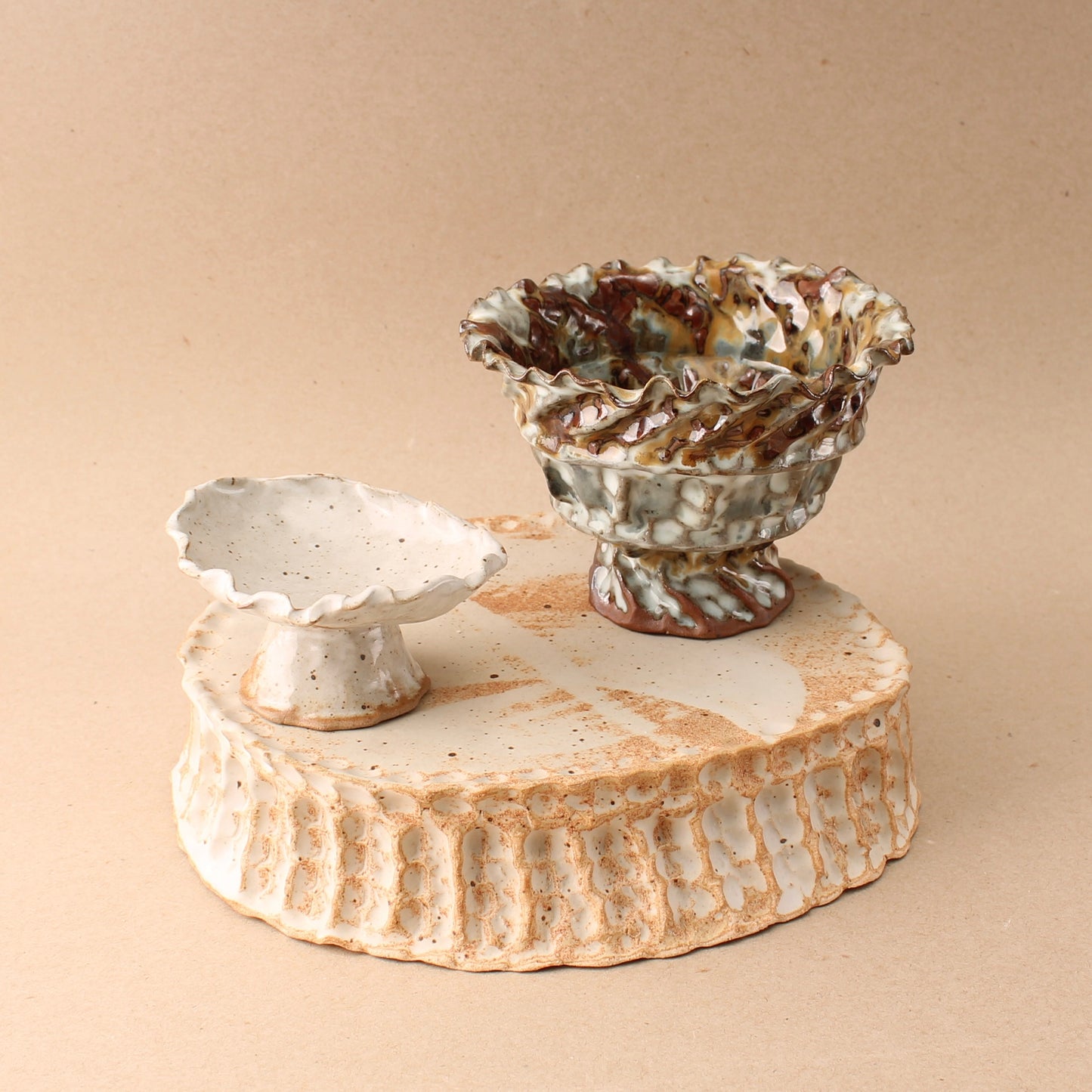 large beige pedestal